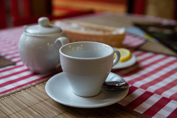 A Cup of green tea with lemon helps to get rid of negative emotions