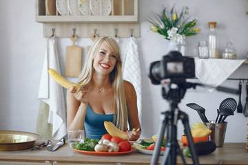 Healthy eating. Dieting and people concept. Blonde recording a video blog