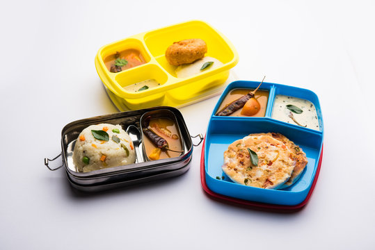 Assorted South Indian tiffin / lunch box food in group, includes idli vada, uttapam/uthappam, upma with sambar and chutney