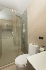  view of nice white tiled modern restroom