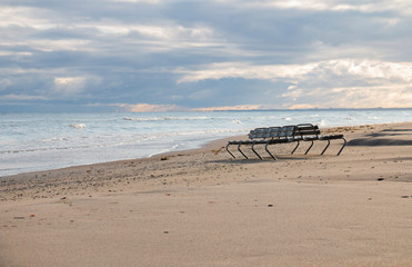 morning on the shore of the Baltic Gulf in Jurmala Latvia shore sand bench