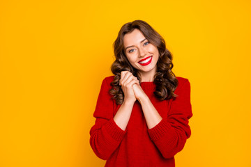 Photo of peaceful charming cute fascinating nice glad pretty sweet girlfriend feeling cozy admiring her vacation wearing red sweater isolated over yellow vivid color background