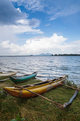 Wooden fishing rowboats at Kala Wewa water reservoir complex, near Aukana village, northern province, Sri Lanka