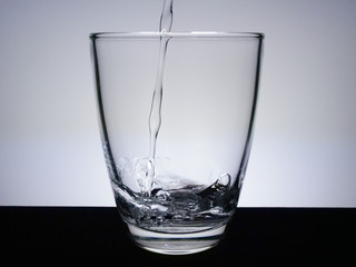 Fill the glass with water.