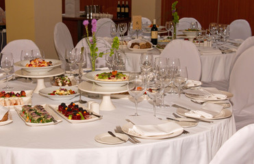 Solemn table with cold appetizers in the restaurant