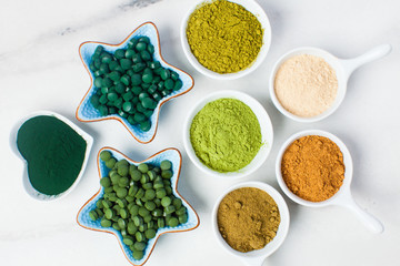 Superfood smoothie boosters, various dietary supplements in bowls