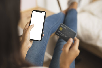 Hands holding phone and card  mock up