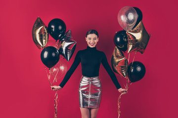 Portrait of her she nice-looking attractive pretty winsome fascinating cheerful cheery glad lady holding in hands air balls isolated on maroon burgundy marsala red pastel color background