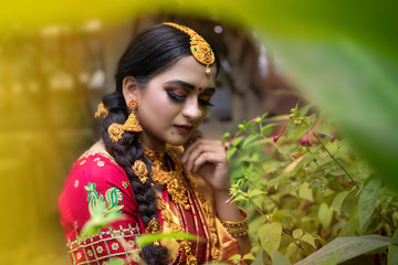 Young indian Bride in traditional sari and jewelry. South Indian and Maharashtran bride look. 