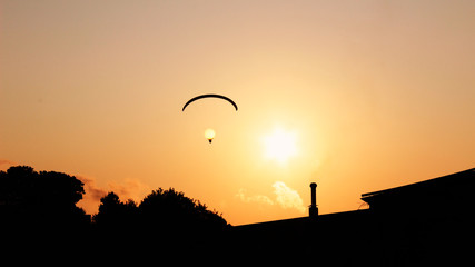 paraglide with light as head