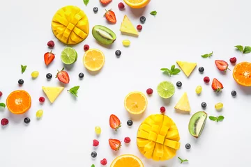 Foto auf Acrylglas Sweet ripe fruits and berries on white background © Pixel-Shot