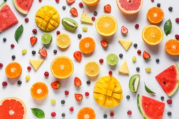 Fotobehang Sweet ripe fruits and berries on white background © Pixel-Shot