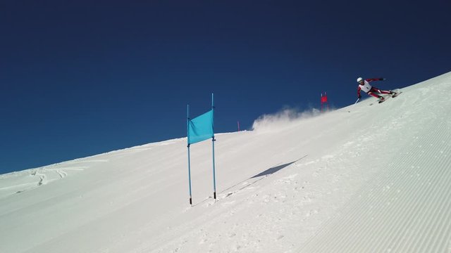 4K slow motion professional ski racer skiing super g