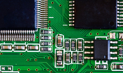 Electronic circuit board close up with processor. Small depth of field