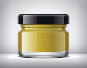 Glass Jar with Mustard on Background. 