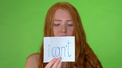 Girl changes I'cant sign to I can, concept can do attitude. Studio shot - Powered by Adobe