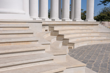 White marble staircase and columns.