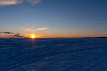 Frozen lake sunset