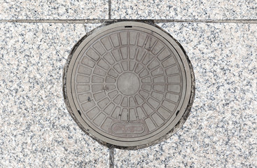 Rusty manhole cap, grunge manhole cover, round