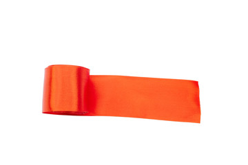 orange fabric tape rolled up with an unwound edge isolated on white