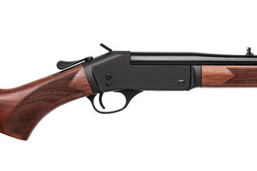 Singleshot rifle with wooden butt  isolated on white background.