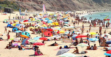 crowded beach Praia da Luz Portugal
