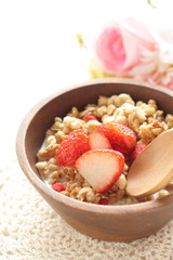 Healthy breakfast, granola in wooden bowl