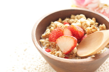 Healthy breakfast, granola in wooden bowl