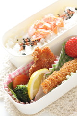 Japanese bento packs lunch, salmon and rice with cutlet