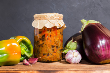 Homemade production canning, canned stewed vegetable puree caviar stewed with eggplant and pepper...