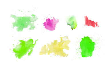 Set watercolor blots.Watercolor splashes and dots texture. Artistic hand drawn background.Green,pink,yellow and red.
