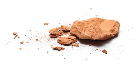 Shattered, broken bricks isolated on white background