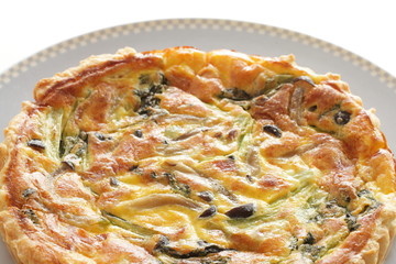 French food, homemade Japanese shimeji mushroom and bacon quiche