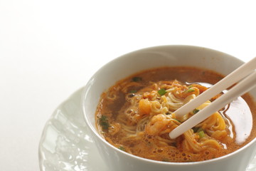 Asian instant noodles in white cup