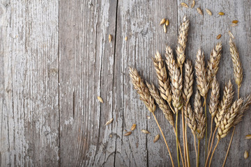 Wheats on wooden background
