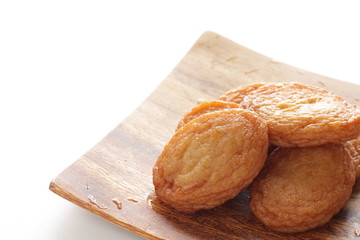 Asian food, fish cake on wooden plate