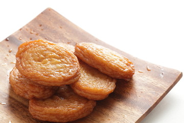 Asian food, fish cake on wooden plate