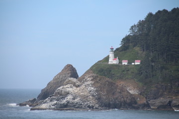 Fototapeta na wymiar lighthouse on rock
