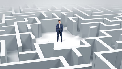 Young businessman standing in a middle of a 3D maze