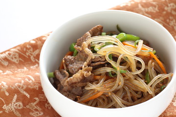 Korean food, glass noodles and beef stir fried with vegetable