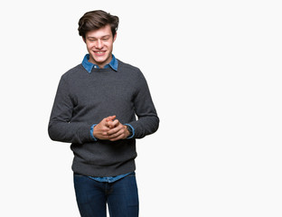 Fototapeta premium Young handsome elegant man over isolated background Hands together and fingers crossed smiling relaxed and cheerful. Success and optimistic