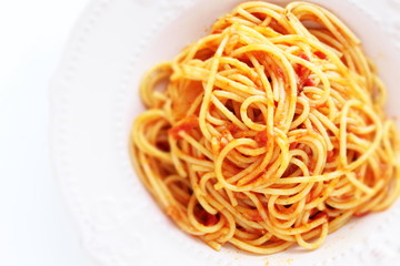 Homemade Italian cuisine, tomato spaghetti on white background