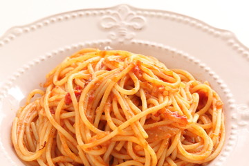 Homemade Italian cuisine, tomato spaghetti on white background
