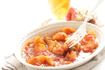 Chicken drumsticks and potato simmered 