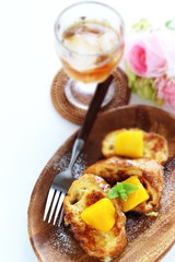 Mango and French toast with mint for gourmet breakfast image