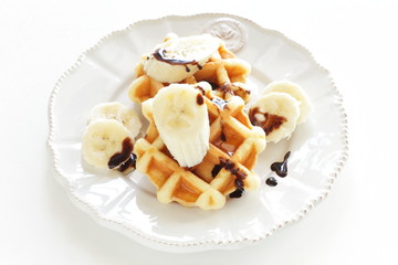 Belgium waffle and banana for breakfast image