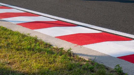 Fotobehang Formule 1 Motor racing circuit Red and White Kerb  © majorstockphoto