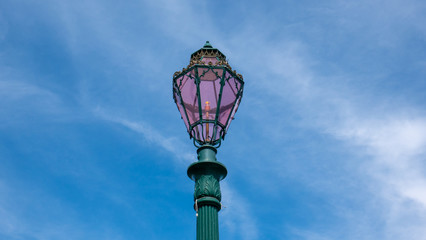 Fototapeta na wymiar Detail of one beautiful pink street light in Venice, Italy