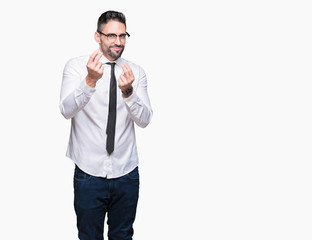 Fototapeta premium Young handsome business man wearing glasses over isolated background Doing money gesture with hand, asking for salary payment, millionaire business