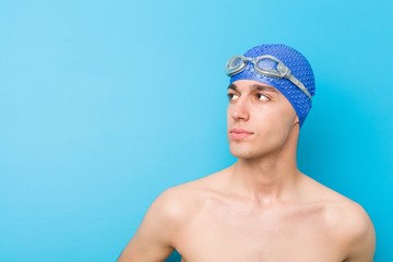 Close up of a teenager caucasian swimmer man